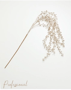 Detail of decorative champagne pearl berry stems for Christmas tree and floral arrangements