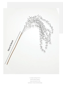 Detailed view of a 50cm silver glitter berry branch for festive Christmas floral decor