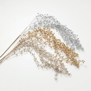 Golden, silver, and champagne artificial berry branches for Christmas tree decor