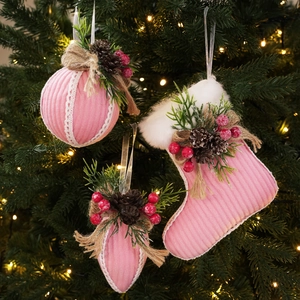 Pink striped fabric Christmas stockings and ornaments with pine cones and berries