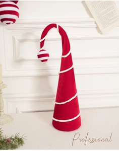 Detail of red velvet cone Christmas tree ornament with white spiral plush stripes