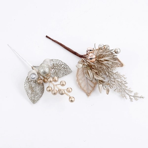 Golden Christmas glitter leaf stems and champagne berry branches for tree decorations