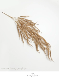 Detailed view of champagne gold artificial glitter branch for Christmas decor