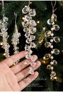 Detail of transparent acrylic crystal grape charms and white pearls for Christmas tree