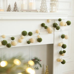 1.8M Christmas ball garland with green and cream flocked velvet spheres on fireplace