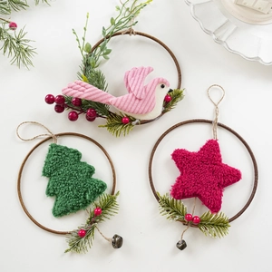 Christmas wreath pendants set with plush birds, trees, and stars on rustic rings