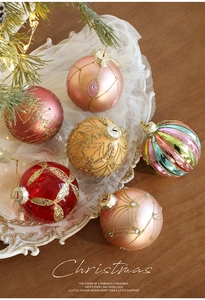 Detail of 8cm colorful glass Christmas balls with gold glitter patterns and jewels