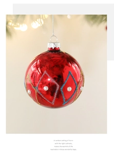 Macro detail of red metallic Christmas ornament with glitter grid and pearl accents