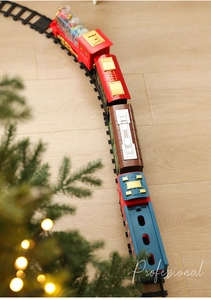 Detailed macro view of festive toy train engine and vintage carriages on a circular track