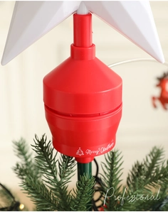 Macro detail of red Merry Christmas base for rotating star tree topper decoration