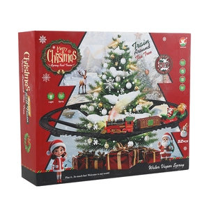 Christmas train track set with rotating tree star and spray function in festive red box