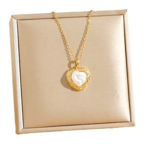 Baroque pearl heart pendant necklace with irregular clover details in gold finish