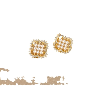 Elegant four-leaf clover earrings with pearl matrix and zircon inlay on gold base