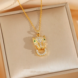 Exquisite gold leopard head necklace with sparkling cubic zirconia and green gem eyes