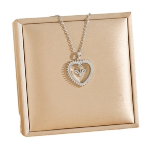 Titanium steel heart necklace with zircon dove pendant on a luxury golden satin gift box