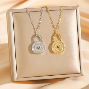 Minimalist V-letter padlock pendant necklace set with crystal zircon in gold and silver
