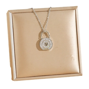 Silver round handbag pendant necklace with micro-paved crystals and V-letter charm