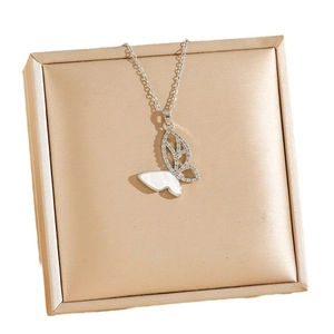 Elegant butterfly necklace with shell inlay and sparkling crystals on champagne satin