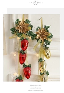 Macro shot of red and gold chrome acorn ornaments with pine needles for Christmas decor