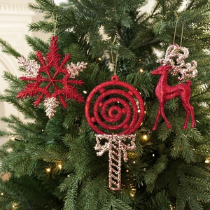 Sparkling red Christmas tree ornaments set with snowflake, lollipop and reindeer shapes