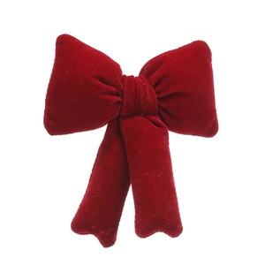 Deep red velvet Christmas tree topper bow with soft texture for holiday decoration