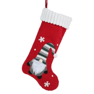 Nordic plush Christmas stocking with gnome patch and white snowflake embroidery