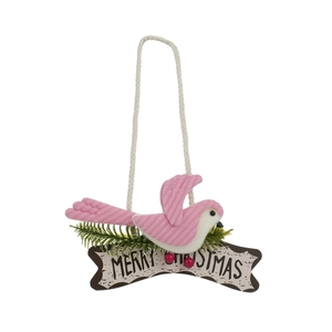 Christmas bird hanging ornament with pink stripes on pine branch and Merry Christmas sign