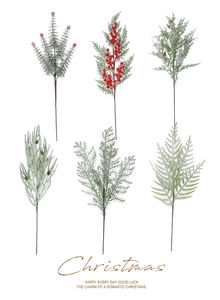 Macro view of snow-covered pine branches, red berries, and cones for Christmas decor