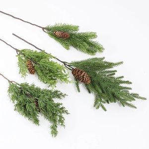 Artificial pine branches with pine cones for Christmas wreaths and home holiday decoration