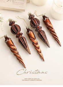 Close-up of bronze flocked icicle ornaments with gold glitter for Christmas decor