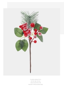 Detailed view of frosted pine needle branch with red berries and snowy bear ornament