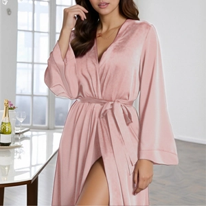 Elegant long-sleeved pink velvet robe for women featuring a V-neck and a matching waist belt