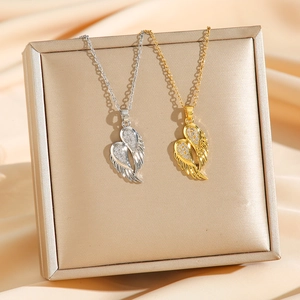 Pendentifs ailes d'ange exquis en or et argent avec zircons micro-pavés étincelants
