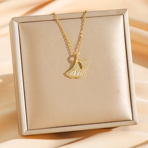 Exquisite gold ginkgo leaf necklace with pavé diamonds and baguette-cut cubic zirconia