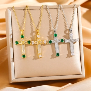 Cross necklaces with heart-shaped zircon stones in gold and silver finishes on silk