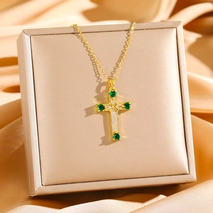 Golden titanium steel cross necklace with micro-pave zircons and green heart stones