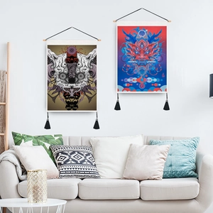 Skull yoga wall hanging with wooden scroll and black tassels in a modern living room