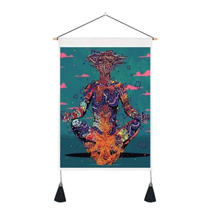 Detail of psychedelic yoga skeleton tapestry featuring intricate textures and black tassels