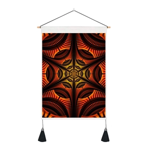 Detail of mandala wall tapestry with orange fractal patterns and wooden hanging rod