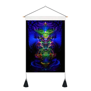 Macro detail of psychedelic mandala yoga tapestry with wood bar and black hanging tassels