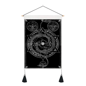 Nordic mandala wall tapestry with sun moon design and black tassels on wooden pole