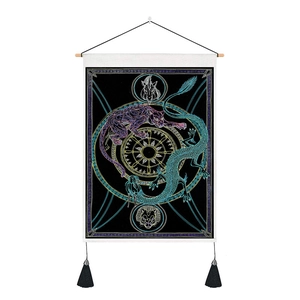 Detail of dragon and leopard mandala wall tapestry with black tassels and wooden scroll