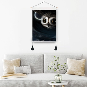 Ethnic Indian style wall tapestry featuring an owl in night sky with tassels