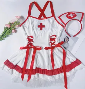 Detailed flat lay of white nurse lingerie set with red cross trim and lace details