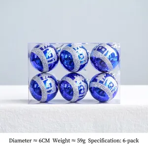 Detail view of 6cm royal blue Christmas ornaments featuring silver glitter castle patterns