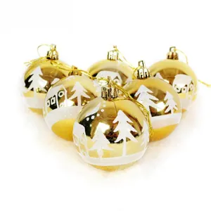 Detail of 6 gold Christmas balls with white snow landscape and house patterns