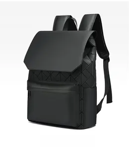 Detail view of the black geometric textured backpack with matte finish and flap closure