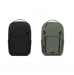 Close-up of durable fabric backpacks in black and olive green with side mesh pockets