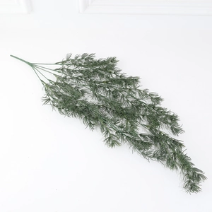 Artificial pine needles with dense green branches for Christmas wreaths and home decor