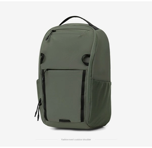 Close-up of durable army green backpack with tactical webbing and side mesh pocket